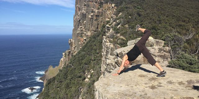 Yoga on cliff